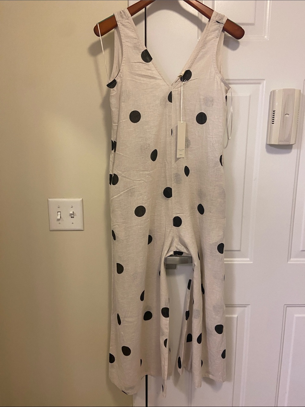 Sleeveless Cream Jumpsuit with Black Polka Dots